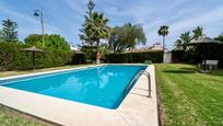 Swimming pool of Single-family semi-detached for sale in Málaga Capital  with Air Conditioner, Heating and Parquet flooring