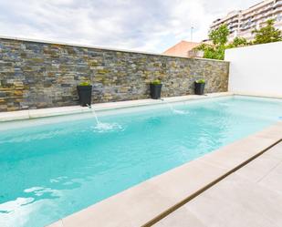 Piscina de Casa adosada de lloguer en Fuengirola amb Aire condicionat, Calefacció i Jardí privat