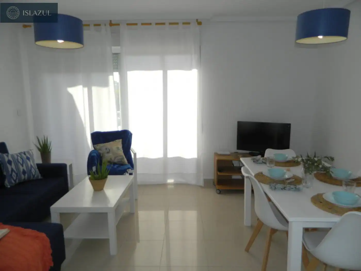 Sala de estar de Dúplex de alquiler en Isla Cristina con Terraza, Balcón y Piscina comunitaria