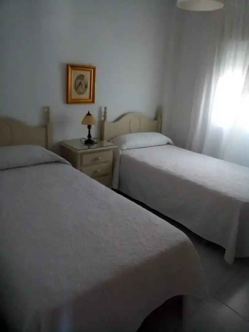 Dormitori de Casa adosada de lloguer en Mazagón amb Jardí privat, Moblat i Forn