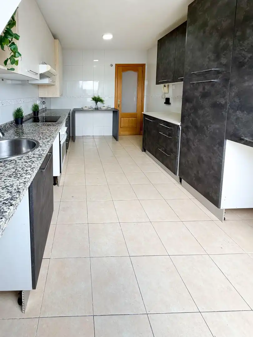 Kitchen of Attic for sale in Oviedo   with Heating, Parquet flooring and Storage room