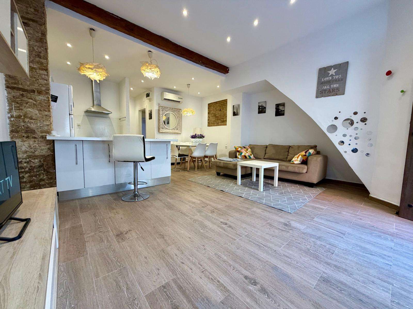 Sala d'estar de Apartament per a compartir en  Valencia Capital amb Aire condicionat, Terrassa i Moblat