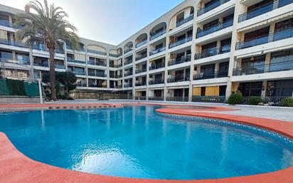 Swimming pool of Flat for sale in Calella  with Air Conditioner, Heating and Parquet flooring