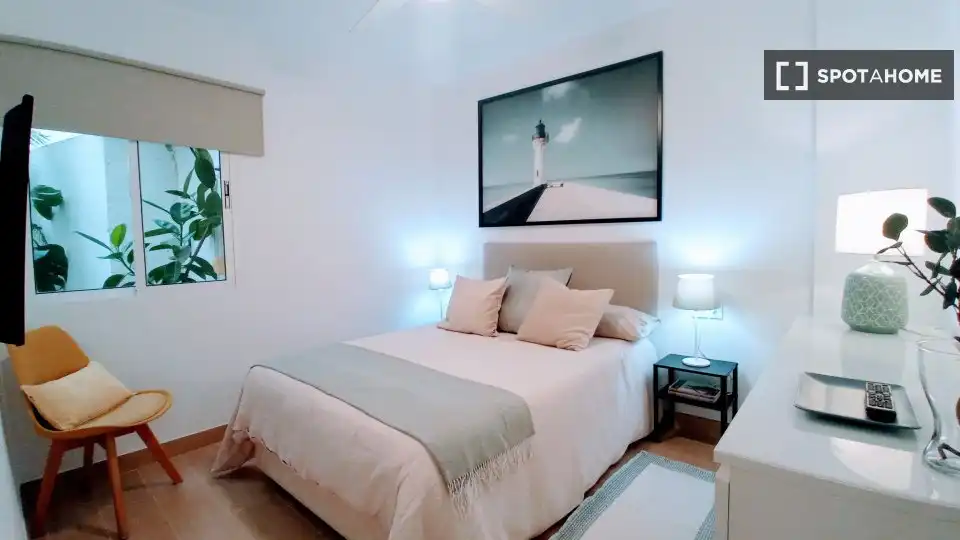 Habitación de Apartamento para compartir en Málaga con Aire acondicionado, Terraza y Amueblado