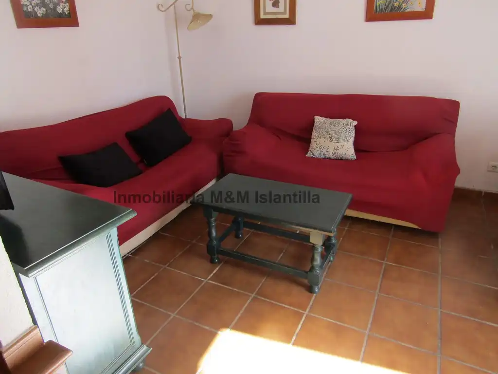 Sala de estar de Casa adosada en venta en Islantilla con Terraza, Trastero y Amueblado