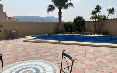 Swimming pool of Single-family semi-detached for sale in Castalla  with Air Conditioner, Heating and Private garden