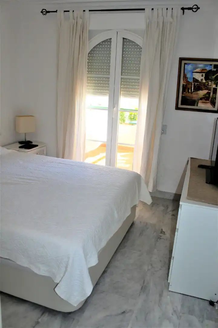 Bedroom of Flat for sale in Marbella  with Air Conditioner, Terrace and Storage room