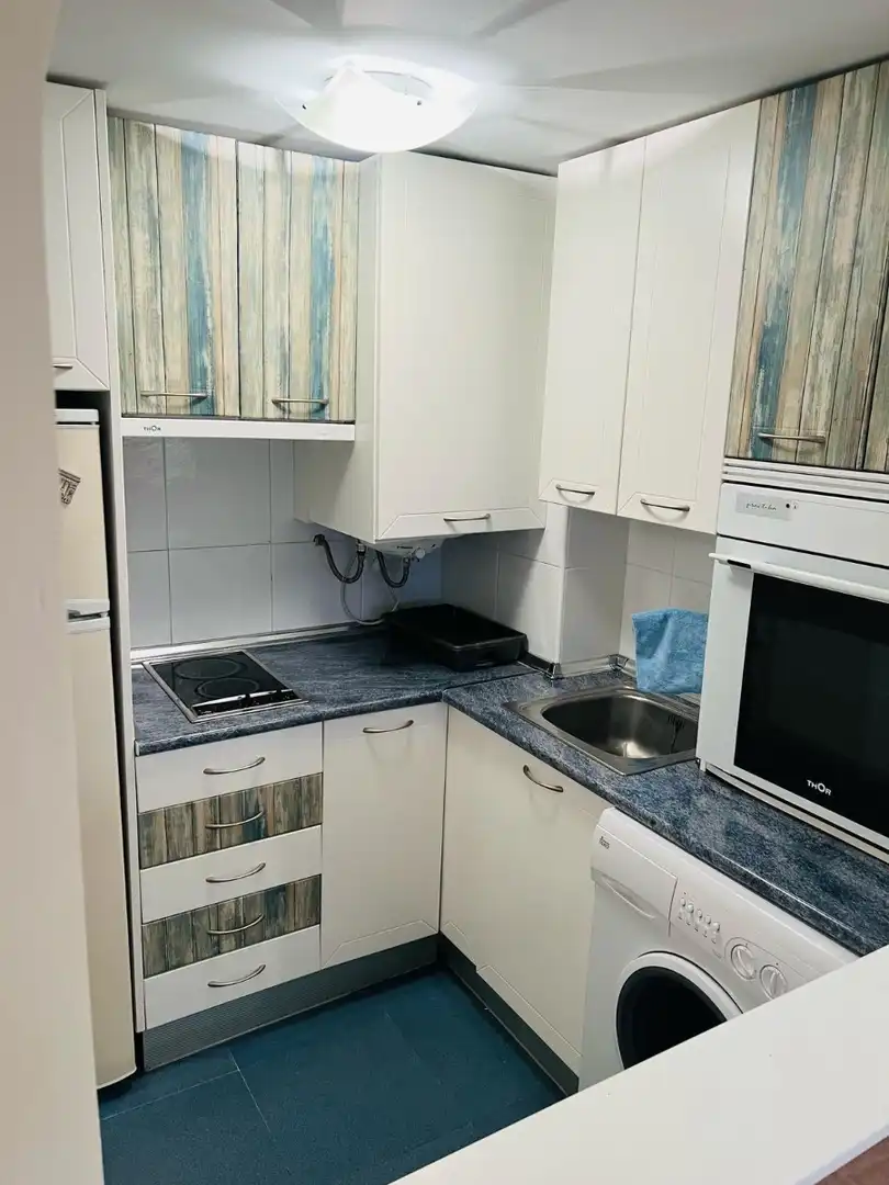 Cuina de Apartament de lloguer en La Manga del Mar Menor amb Aire condicionat, Calefacció i Piscina