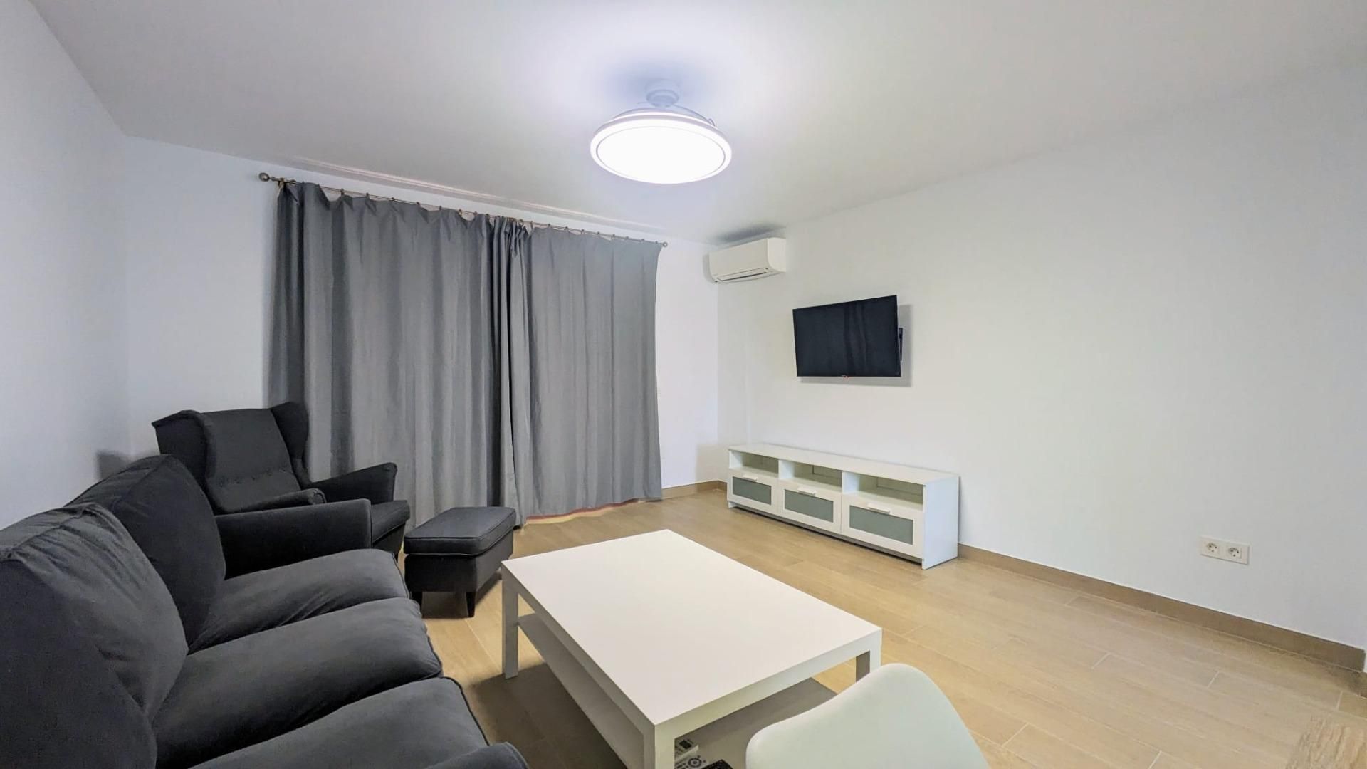 Living room of Flat to rent in Fuengirola  with Air Conditioner, Heating and Parquet flooring