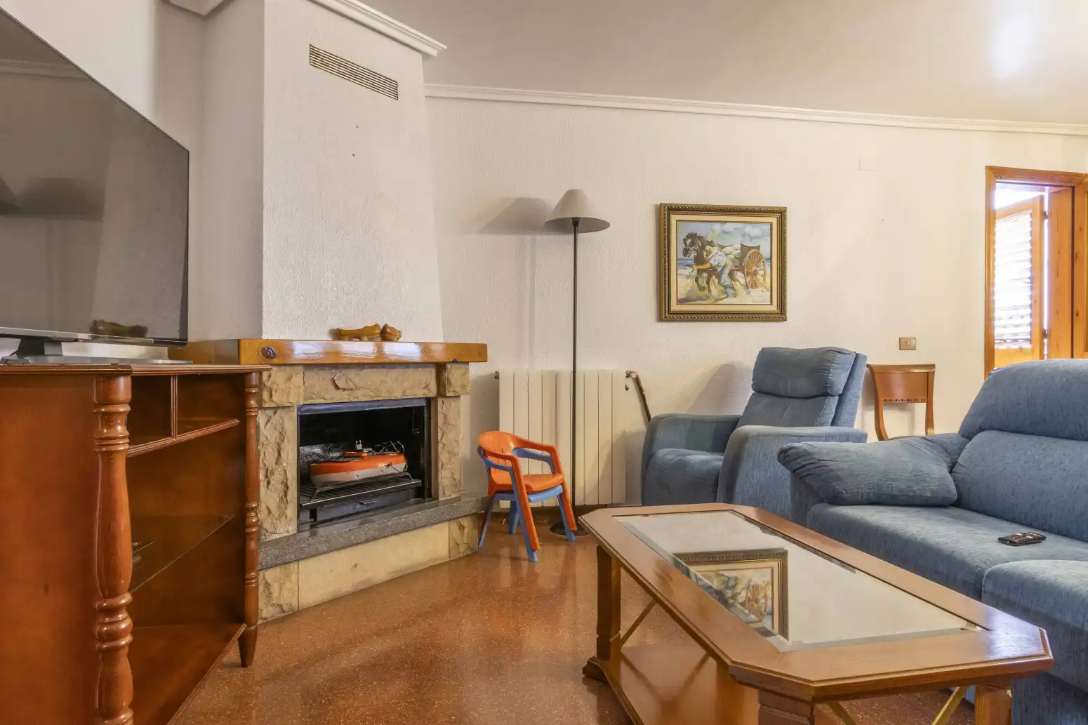 Sala d'estar de Casa adosada en venda en Sagunto / Sagunt amb Terrassa i Balcó