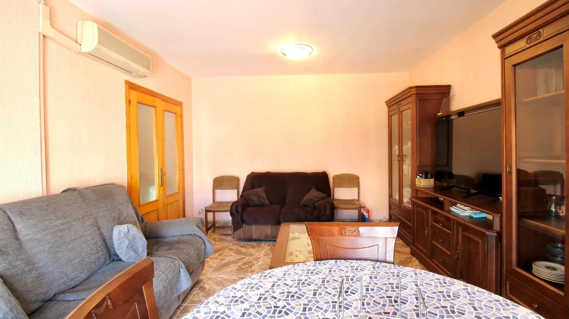 Sala de estar de Casa adosada en venta en Roquetas de Mar con Aire acondicionado, Terraza y Trastero