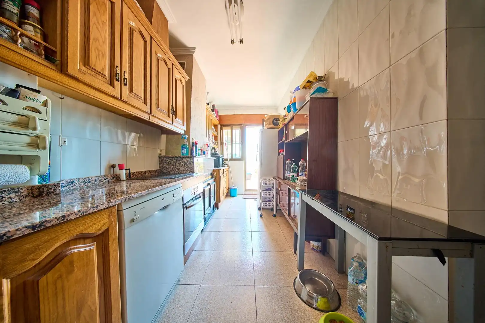 Cocina de Casa adosada en venta en Baza con Calefacción, Terraza y Trastero
