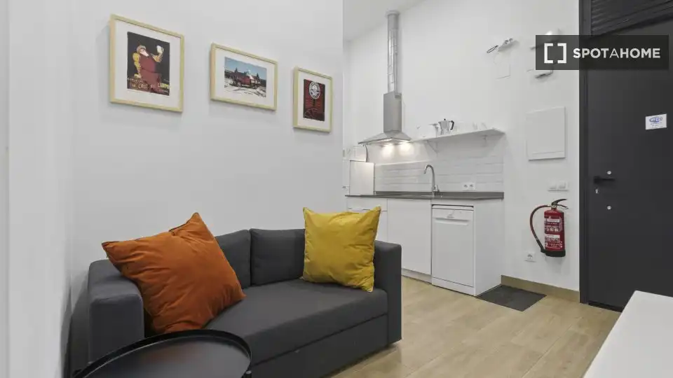 Sala de estar de Apartamento para compartir en Sevilla con Aire acondicionado, Terraza y Amueblado