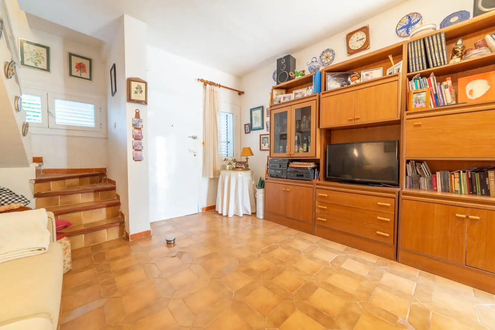 Sala d'estar de Casa adosada en venda en San Javier amb Aire condicionat, Jardí privat i Moblat