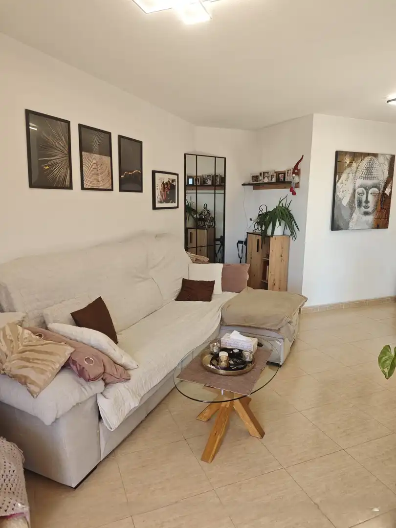 Sala d'estar de Apartament en venda en Calpe / Calp amb Aire condicionat, Calefacció i Jardí privat
