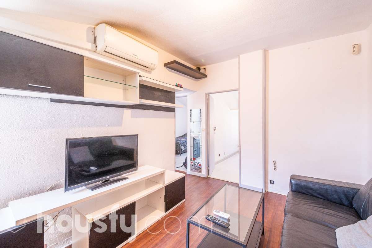 Sala d'estar de Pis en venda en  Madrid Capital amb Aire condicionat i Moblat