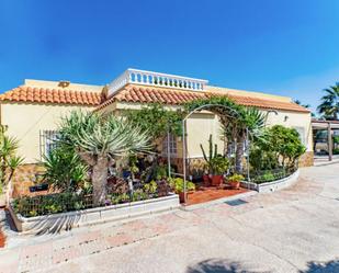 Exterior view of House or chalet for sale in  Almería Capital  with Air Conditioner and Swimming Pool