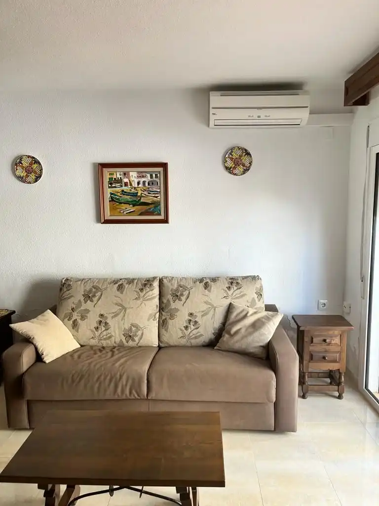 Sala d'estar de Casa adosada en venda en Peñíscola / Peníscola amb Aire condicionat