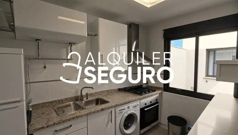 Kitchen of Flat for rent in Sanlúcar la Mayor  with Air Conditioner and Furnished