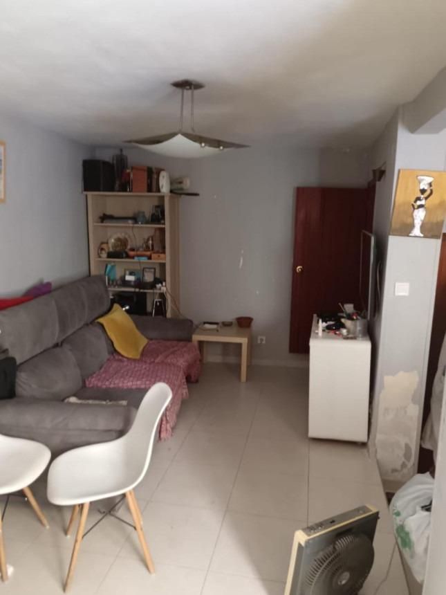 Sala d'estar de Casa adosada en venda en Finestrat