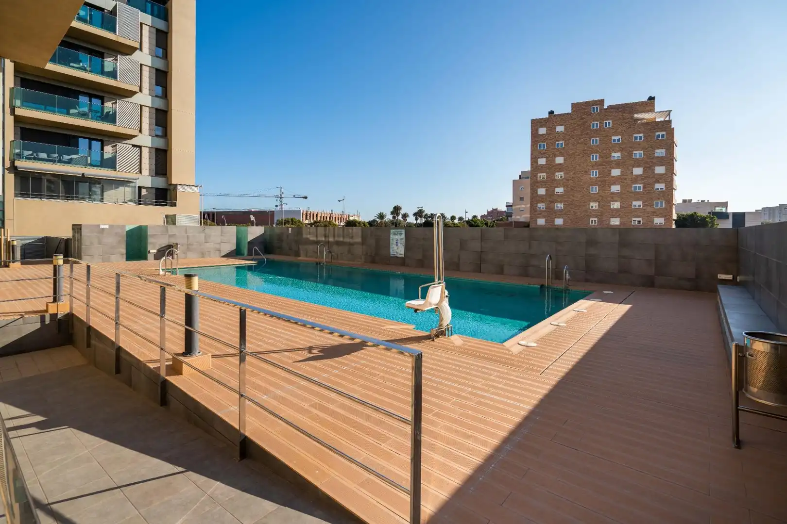 Swimming pool of Flat for sale in Almería  with Air Conditioner, Terrace and Storage room