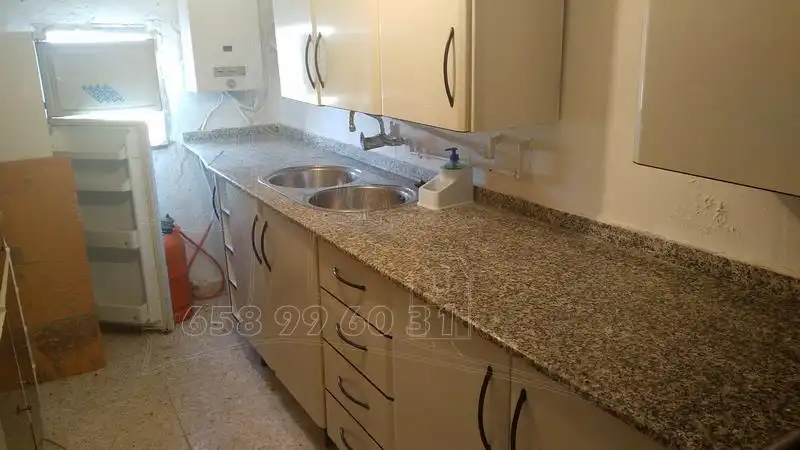 Cuina de Finca rústica en venda en Baza amb Jardí privat, Terrassa i Traster