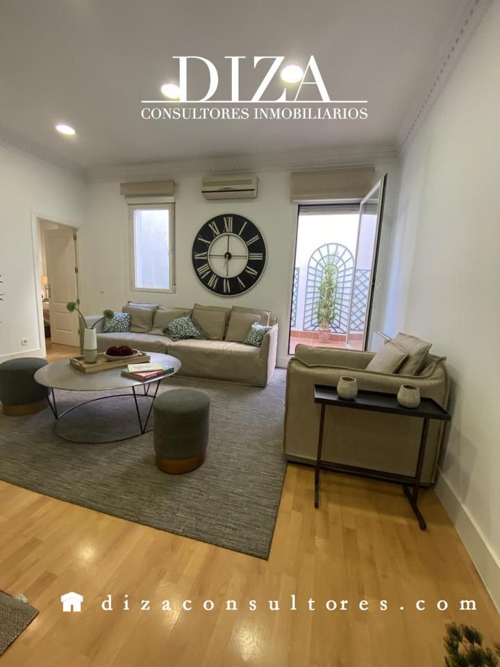 Living room of Planta baja for rent in  Madrid Capital  with Air Conditioner, Heating and Terrace