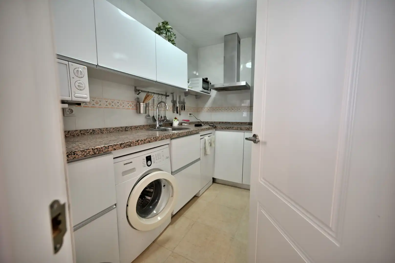 Kitchen of Apartments for sale in Benalmádena  with Air Conditioner, Terrace and Swimming Pool
