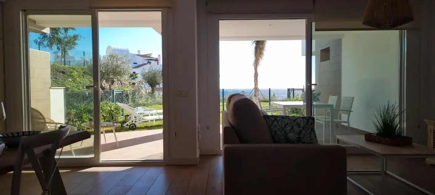 Sala d'estar de Apartament de lloguer en Torrox amb Aire condicionat, Calefacció i Jardí privat