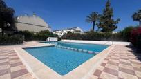 Swimming pool of Single-family semi-detached for sale in El Campello  with Air Conditioner, Terrace and Alarm