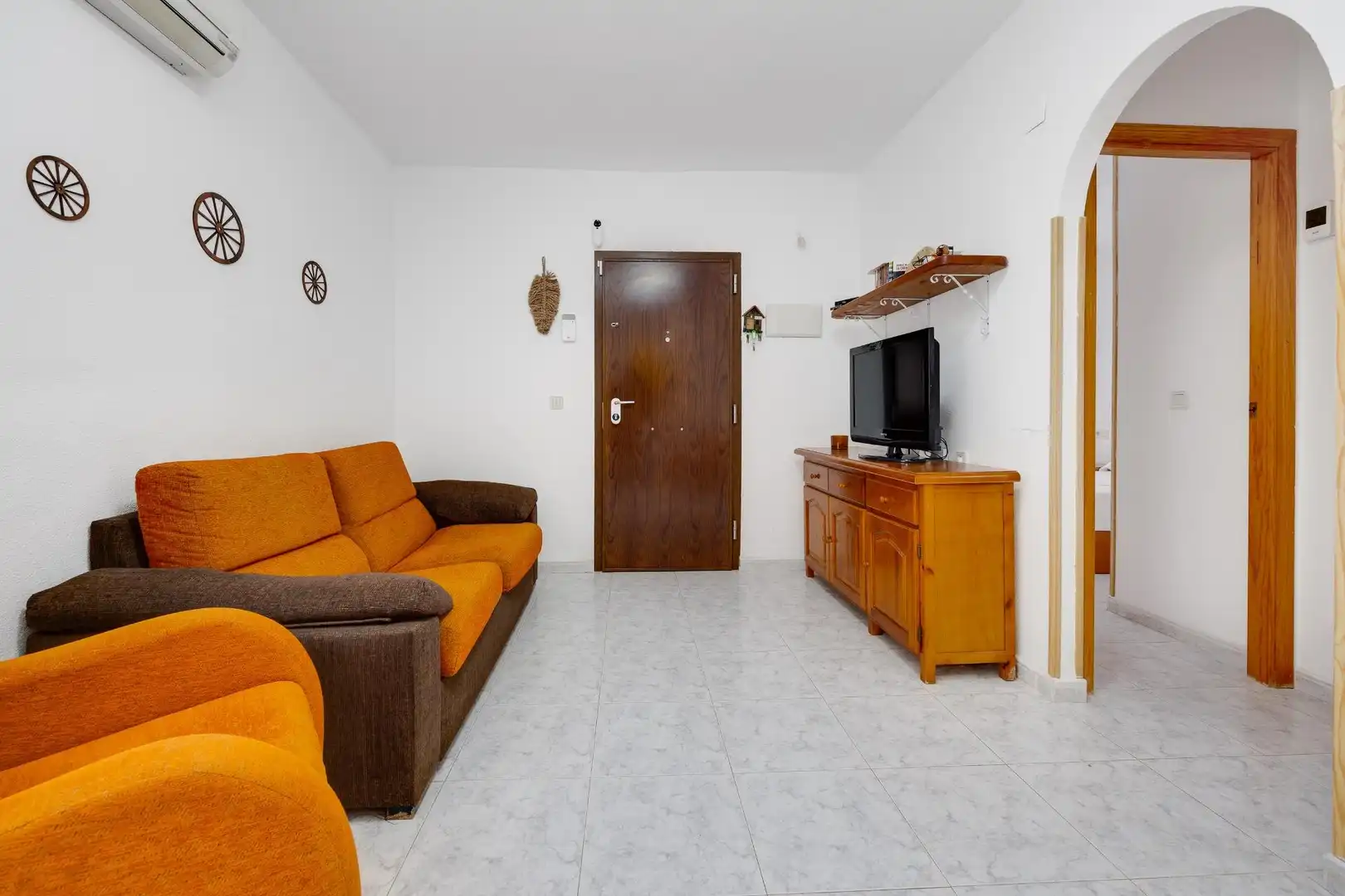 Sala d'estar de Apartament en venda en Torrevieja amb Aire condicionat, Jardí privat i Terrassa