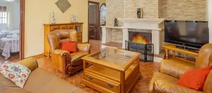 Living room of Houses for sale in Málaga  with Air Conditioner, Private garden and Terrace