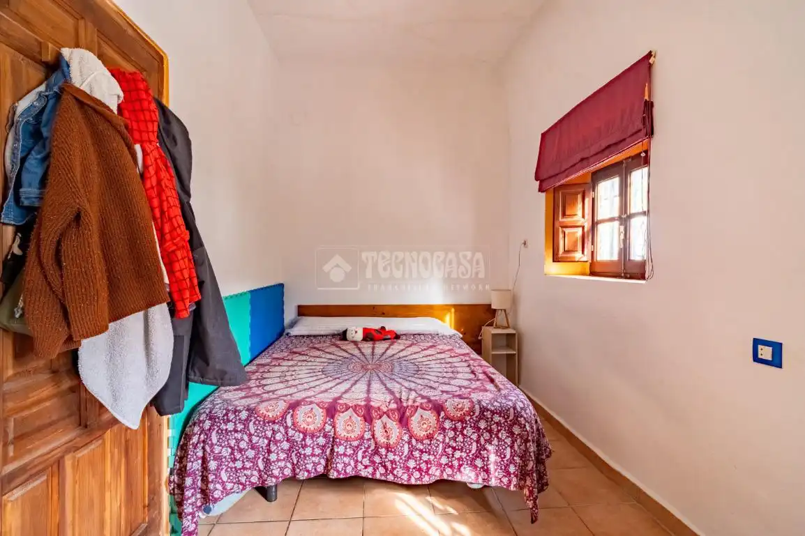 Dormitori de Casa adosada en venda en Órgiva amb Aire condicionat, Terrassa i Moblat