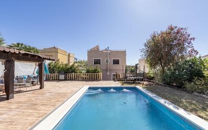 Swimming pool of House or chalet for sale in Dílar  with Air Conditioner, Terrace and Swimming Pool