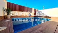 Swimming pool of Single-family semi-detached for sale in Los Alcázares  with Air Conditioner, Heating and Terrace