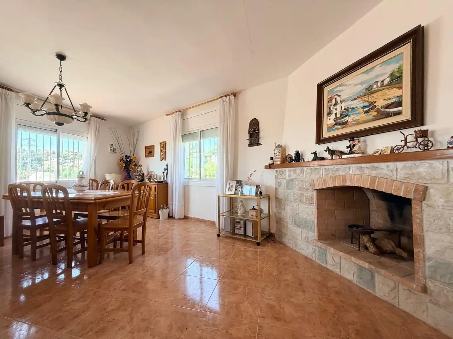 Sala d'estar de Casa o xalet en venda en Cunit amb Jardí privat, Terrassa i Traster