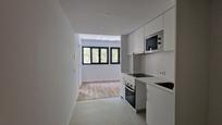 Kitchen of Duplex for sale in Girona Capital  with Air Conditioner