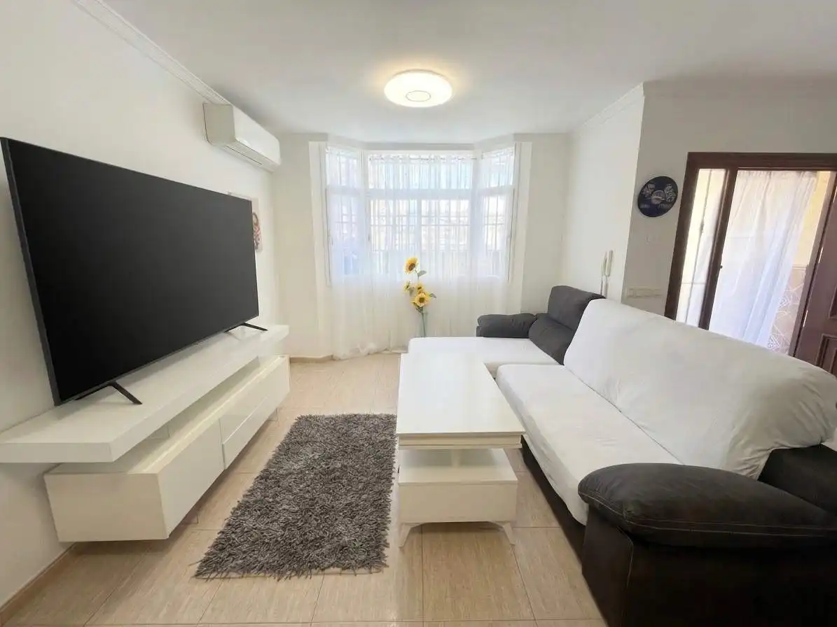 Sala d'estar de Casa adosada en venda en Vélez-Málaga