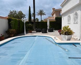 Swimming pool of House or chalet for sale in La Manga del Mar Menor  with Air Conditioner, Heating and Private garden