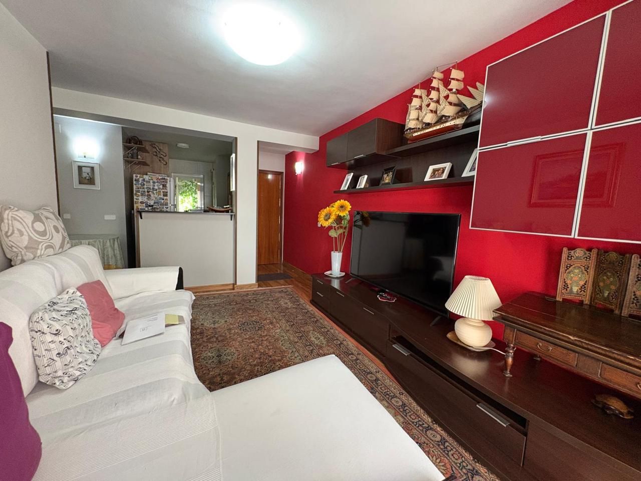 Sala d'estar de Apartament en venda en  Madrid Capital amb Aire condicionat, Jardí privat i Terrassa