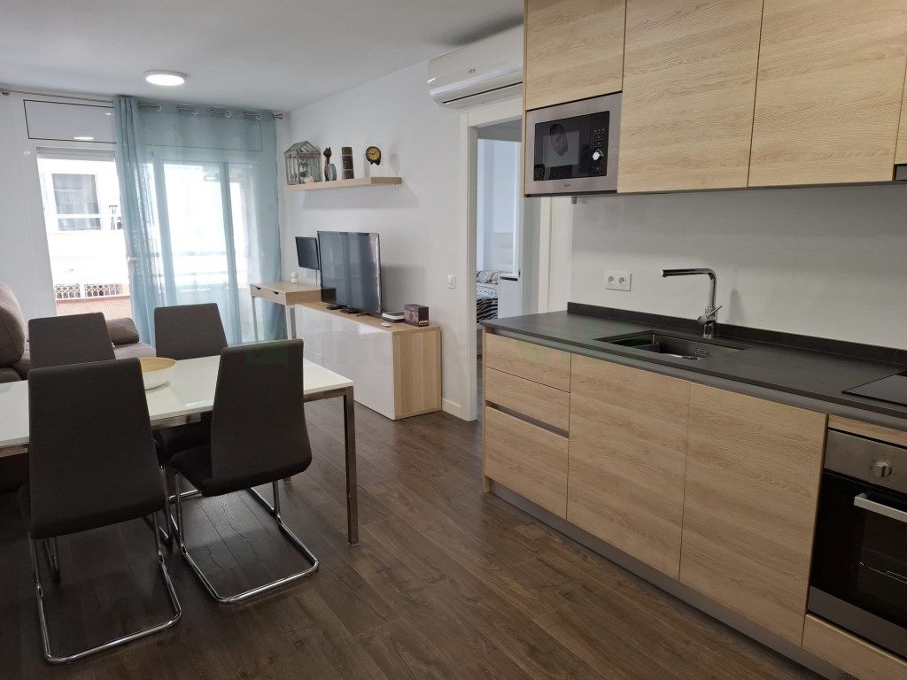 Kitchen of Flat for sale in Pineda de Mar  with Air Conditioner, Balcony and Community pool