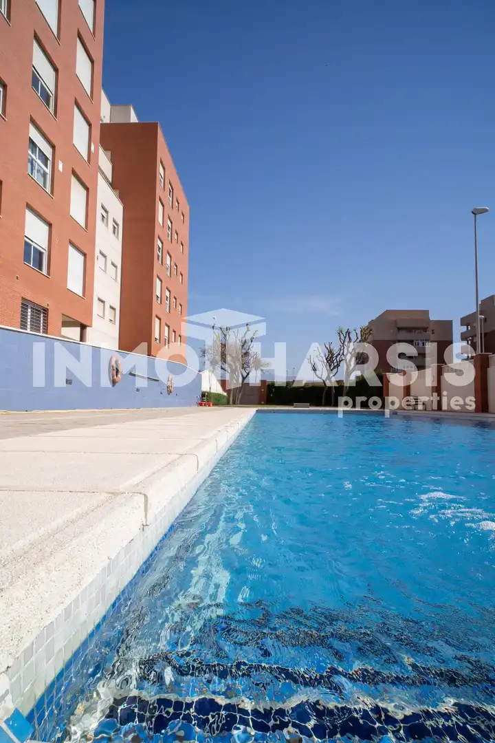 Swimming pool of Flat for sale in Almería  with Air Conditioner, Heating and Private garden