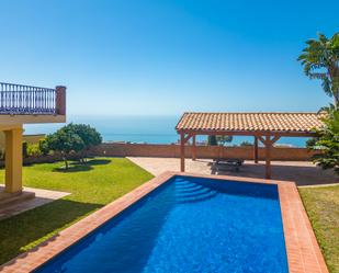 Swimming pool of House or chalet for sale in Benalmádena  with Air Conditioner, Heating and Private garden