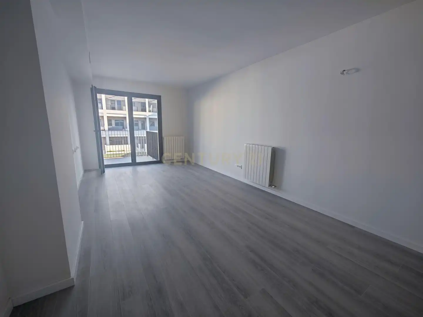Sala d'estar de Apartament en venda en Sabadell amb Aire condicionat, Jardí privat i Piscina
