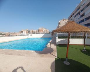 Swimming pool of Flat for sale in Roquetas de Mar  with Air Conditioner, Heating and Private garden