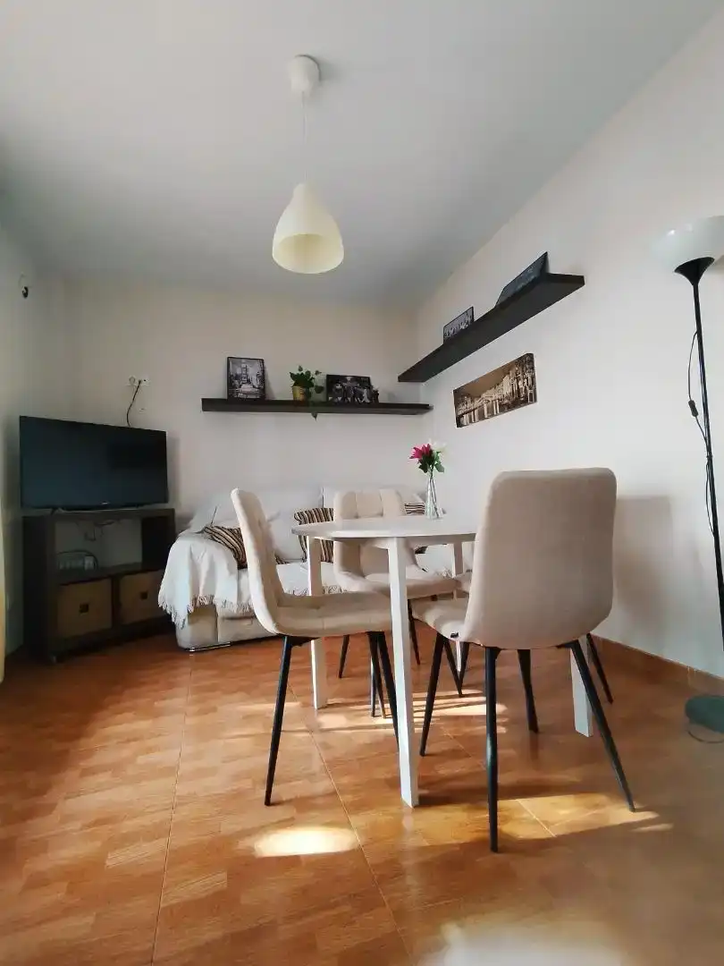 Sala d'estar de Casa adosada per a compartir en Córdoba amb Aire condicionat, Moblat i Forn