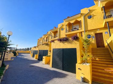 Terraced house with pool for sale in Manilva Pueblo