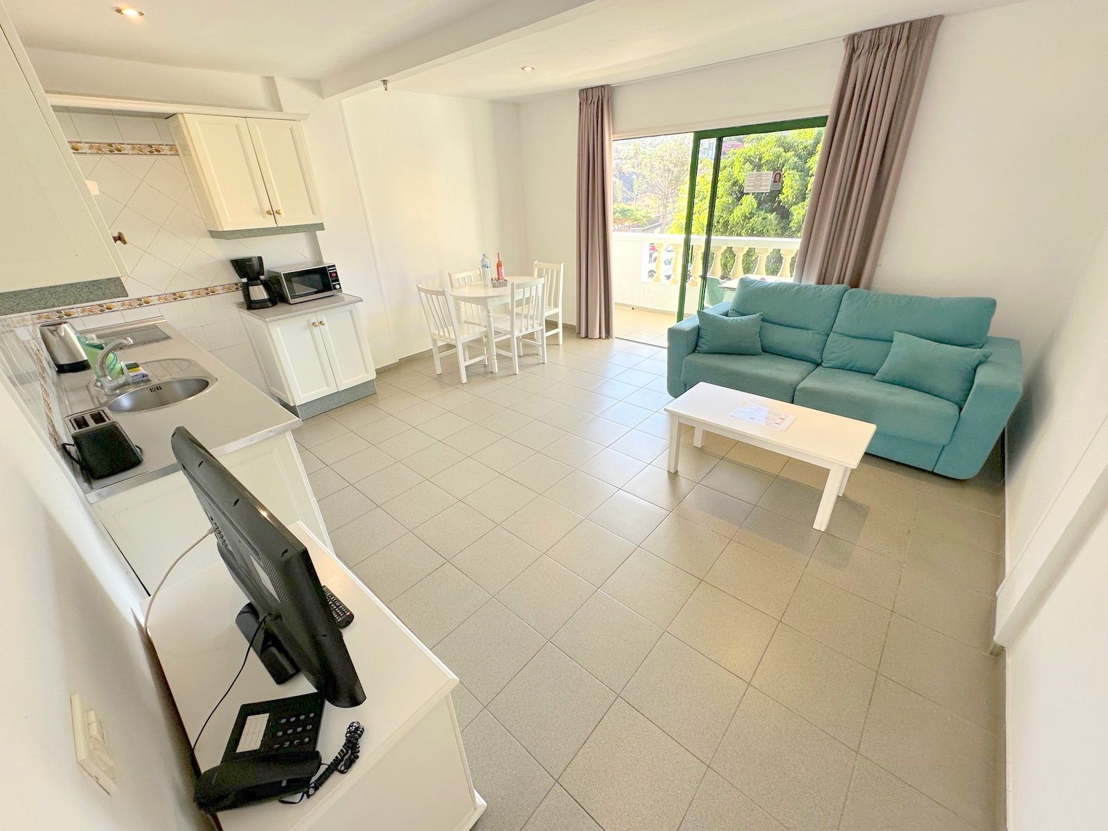 Living room of Apartment for sale in Puerto de la Cruz  with Storage room, Furnished and TV
