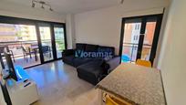 Sala d'estar de Apartament de lloguer en Gandia amb Aire condicionat, Piscina i Moblat