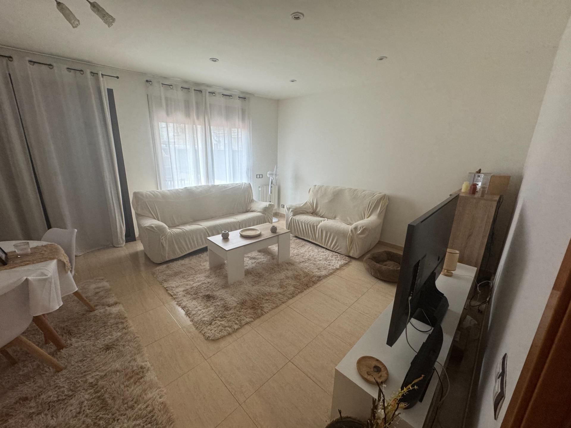 Sala de estar de Casa adosada en venta en Bellvei con Terraza